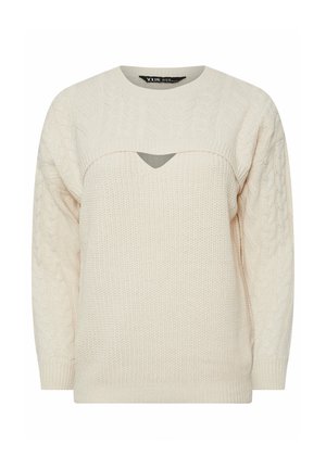 Cream-colored knitted sweater with a cable design, featuring a wide neckline and a triangular cutout at the front. Long sleeves included.