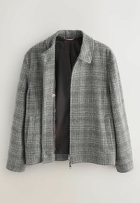 Gray plaid jacket with a collared neckline, front zipper, and two side pockets. Interior lined in dark fabric with a subtle pattern.