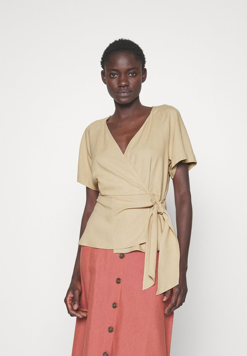 Vero Moda Tall VMMYMILO WIDE WRAP Bluse irish cream/beige Zalando.ch