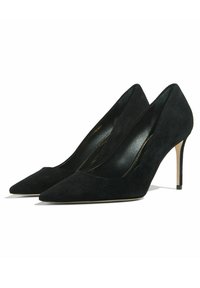 Décolleté nere in suede con punta affusolata e sottile tacco a stiletto, dotate di una fodera interna liscia e dettagli di cucitura minimi.