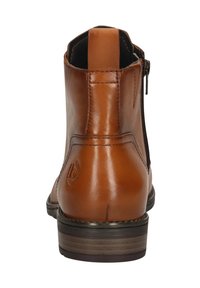 Braune Leder-Ankelstiefel mit glatter Oberfläche, seitlichem Reißverschluss und niedrigem, gestapeltem Absatz. Mit einem Logo-Detail an der Ferse.