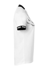 Camisa deportiva blanca con cuello y mangas negras, con la marca "Kempa" en los puños de las mangas y patrones diagonales grises en el frente.