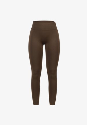 Høj talje brune leggings lavet af strækbart stof med en glat overflade. Har en bred talje og tætsiddende pasform.