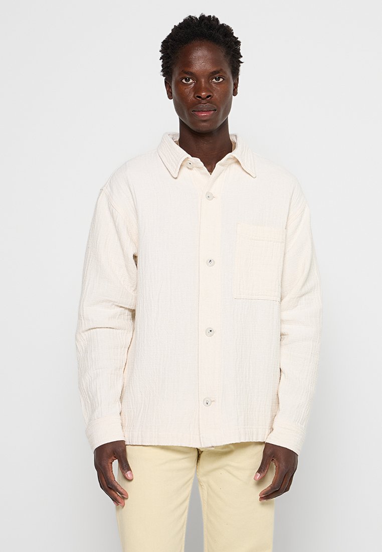 NN.07 Lichte jas crème