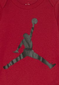 Jordan JUMPMAN BOOTIE SET UNISEX - Gorro - gym red