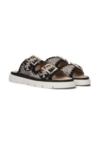 Zwarte en beige slide sandalen met een gevlekt patroon, gouden gespen en een dikke witte zool met een gestructureerd oppervlak.