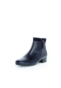 Bottine en cuir marine foncé avec une texture lisse, bout arrondi, fermeture à glissière sur le côté et un petit talon large.