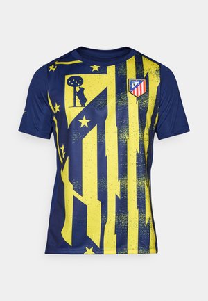 Athletic jersey in navy and yellow, featuring bold vertical stripes, textured patterns, and a club logo on the chest with a crew neck.