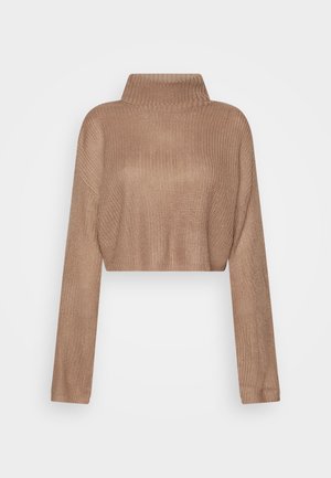 Cropped, light brown knit sweater with a high collar, long sleeves, and a textured ribbed pattern. Soft material and relaxed fit.