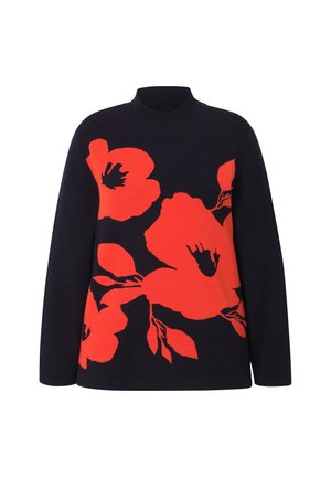 Merino neulepaita, jossa on suuria punaisia kukkakuoseja. Korkea kaulus, pitkät hihat ja teksturoitu neulontapinta.