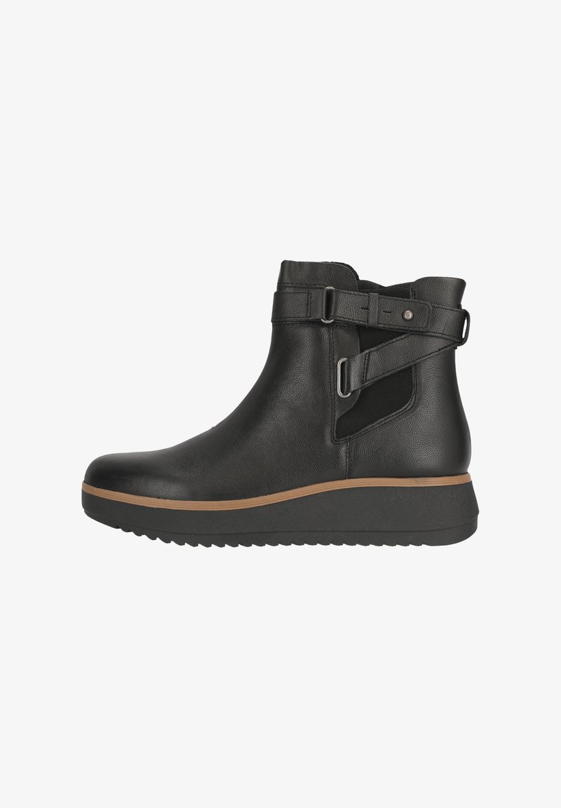 Bottines en cuir noir avec des sangles ajustables et des panneaux élastiques sur les côtés, présentant un dessus texturé et une semelle en caoutchouc épaisse avec un accent marron clair.