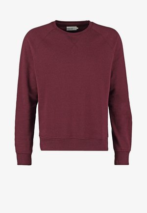 Sweatshirt bourgogne avec un col ras du cou, des manches raglan, des poignets et un ourlet côtelés, fabriqué à partir d'un doux mélange de coton.