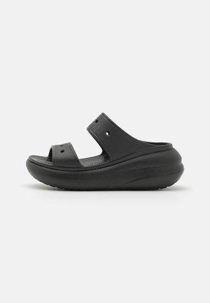 Heeled mules - black