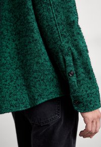 J.LINDEBERG Lehká bunda - green