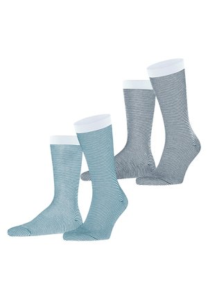 Vier Paare Socken in verschiedenen Blautönen und Grau, mit horizontalen Streifen und weißen Rippenbündchen. Aus weichem Baumwollmischmaterial.
