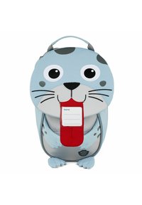 Blue animal-shaped backpack resembling a seal, with large eyes, whiskers, red tongue, and a name tag. Made of durable fabric, features cartoon detailing.