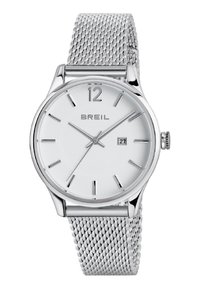 Montre à bracelet en maille argentée avec un cadran rond blanc, des marqueurs d'heure minimalistes, et un affichage de date. Nom de la marque "BREIL" imprimé sous le 12.
