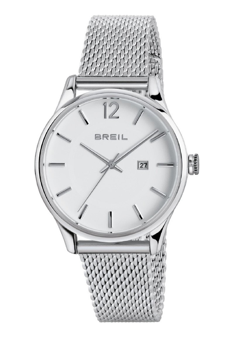 Montre à bracelet en maille argentée avec un cadran rond blanc, des marqueurs d'heure minimalistes, et un affichage de date. Nom de la marque "BREIL" imprimé sous le 12.
