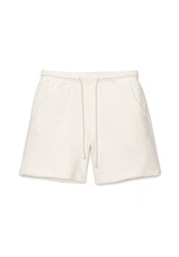 Shorts blancs texturés en tissu léger. Dotés d'une taille élastique avec cordon de serrage, de deux poches latérales et d'une coupe décontractée.