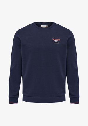 Marinefarbener Sweatshirt aus Baumwolle, mit Rundhalsausschnitt, langen Ärmeln und einem kleinen rot-weißen Logo auf der linken Brust. Strukturiertes Bündchen.