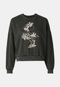 Sudadera negra con un diseño recortado, que presenta un gráfico de un personaje de dibujos animados en un estilo desgastado. Mangas largas con puños y dobladillo acanalados.