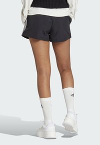 adidas Sportswear ESSENTIALS STRIPES - Sports shorts - black   white