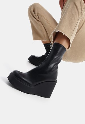 Botines de tacón - black