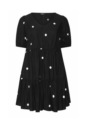 Robe courte noire à manches courtes avec des pois blancs, encolure en V, taille froncée et jupe à volants.