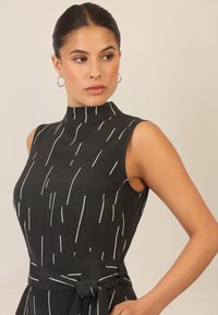 Apart OVERALL - Tuta jumpsuit - schwarz creme