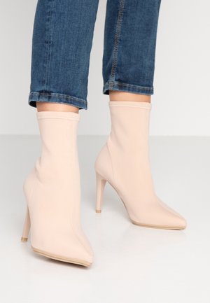 Bottines à talons hauts - nude