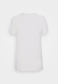 Bílá bavlněná tričko s krátkými rukávy, klasický kulatý výstřih a jednoduchý design; hladká textura a jednoduchá silueta.