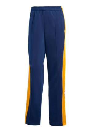 Navy blue athletic pants with yellow side panels, elastic waistband, and tapered legs. Made from lightweight, breathable fabric.