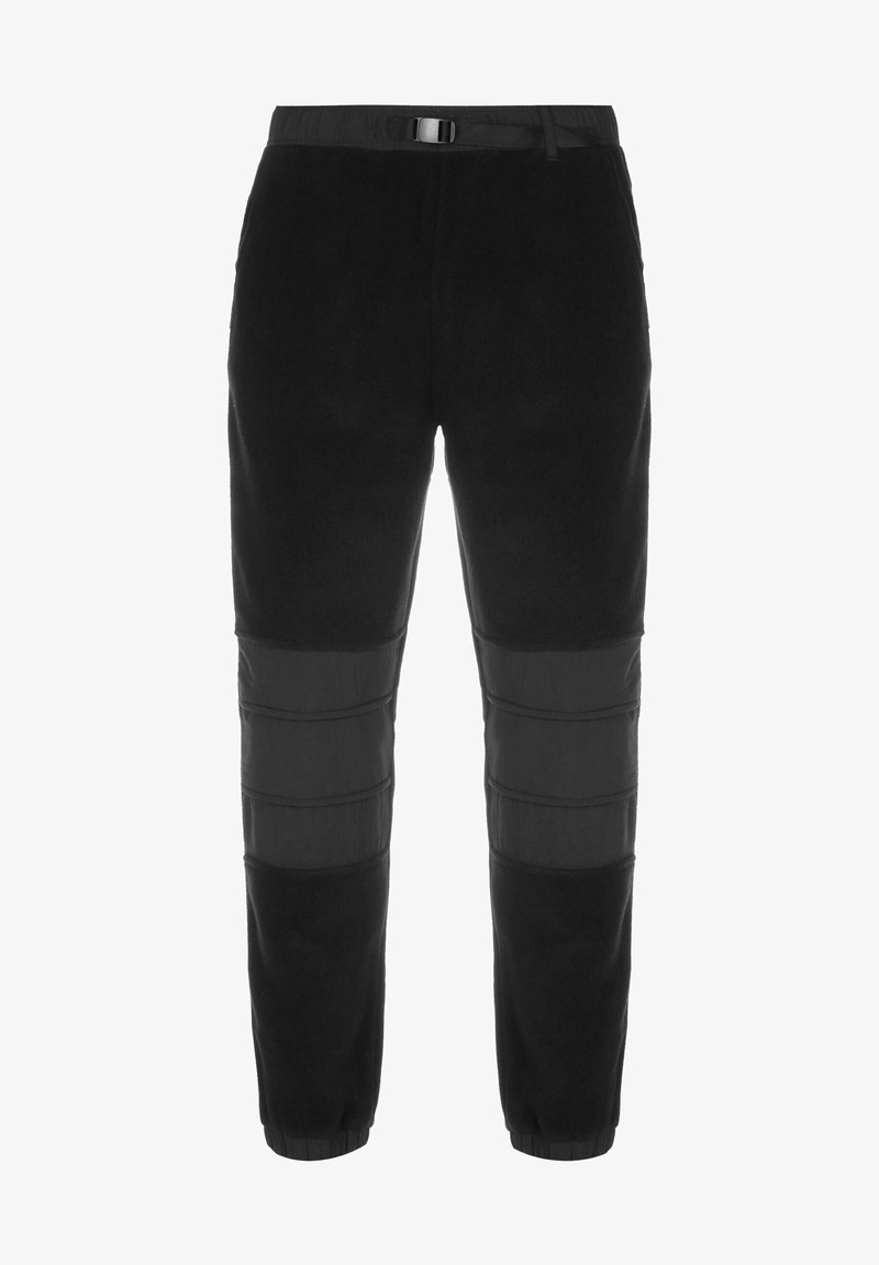 Pantalones de forro polar negros con un ajuste ceñido, que presentan una textura contrastante en las rodillas y un lazo para cinturón en la cintura para un ajuste ajustable.