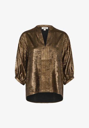 Metāliska bronzas blūze ar V veida kakla izgriezumu un trīs ceturtdaļu burbulīšiem. Mīksta tekstūra, brīvi pieguļošs fasona un garāka aizmugurējā apmale.