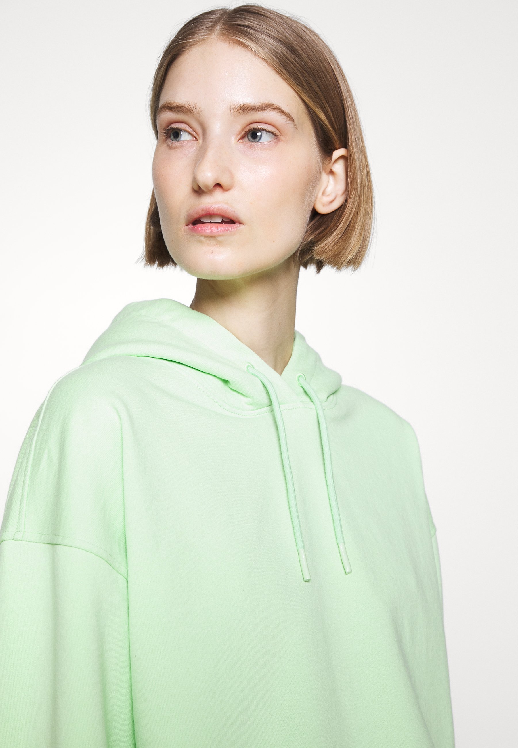 light green cropped hoodie