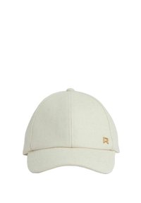 Light beige baseball cap made of soft fabric, featuring a structured crown and a curved brim. Gold logo accent on the side.