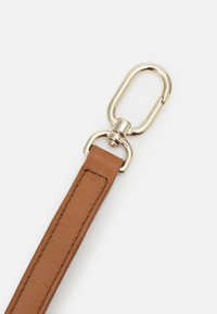 Brown leather strap with a smooth texture, featuring a gold metal clip. Strap is flat and rectangular, with neat stitching along the edges.