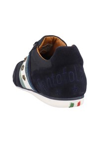Navy blue suede sneaker with fabric accents, metal studs, and embroidered logo. Features a white sole with Italy color stripes at the heel.