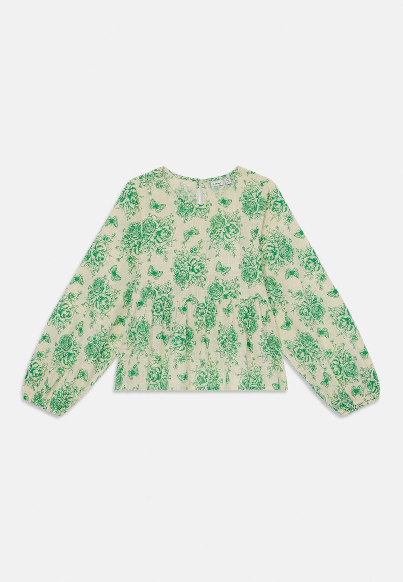 Maglietta a maniche lunghe di colore beige chiaro con motivo floreale verde, dotata di un colletto rotondo e dettagli arricciati in vita. Tessuto morbido.
