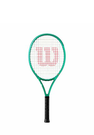 Green tennis racket with black grip and white strings, featuring a prominent red "W" logo on the string bed.