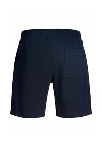 Short bleu marine avec taille élastique et une seule poche arrière sur le côté droit, vu de dos.