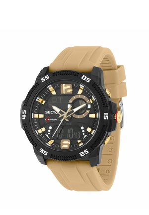 Orologio da polso analogico-digitale nero e oro con cinturino in gomma beige e ghiera marcata che mostra i numeri ogni cinque minuti.