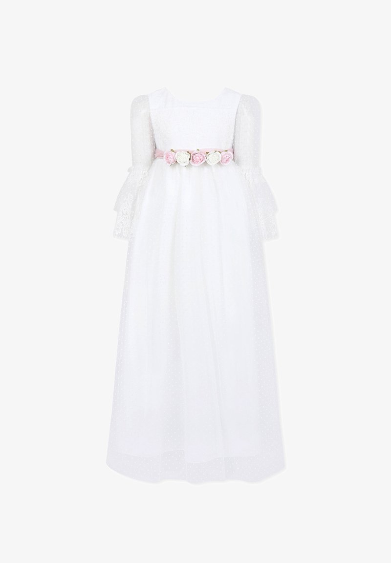 Robe blanche avec des manches en dentelle transparente, tissu à pois et une ceinture en ruban rose ornée de trois accents floraux. Silhouette en A.
