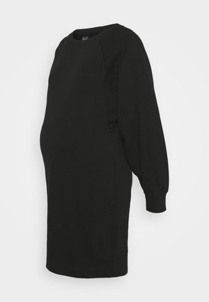 Zwarte zwangerschap jurk van zachte stof, met een ronde halslijn, lange mouwen, een losse pasvorm en zijzakken voor extra gemak.