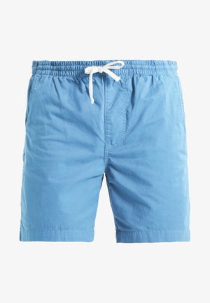 Bañador azul claro hecho de una mezcla de algodón, con una cintura elástica, cierre con cordón, bolsillos laterales y un ajuste relajado.