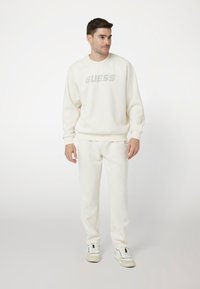 Guess OPTIK - Treningo apatinė dalis - weiß