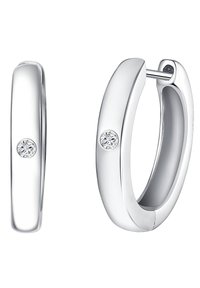 Pendientes de aro de plata con un acabado pulido, que cuentan con un pequeño acento de diamante redondo en cada pendiente. Diseño liso y redondeado.