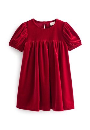 Rød fløjlsbabykjole med puffede korte ærmer, indsnævret talje, rund halsudskæring og knaplukning med nøglehul bagpå.