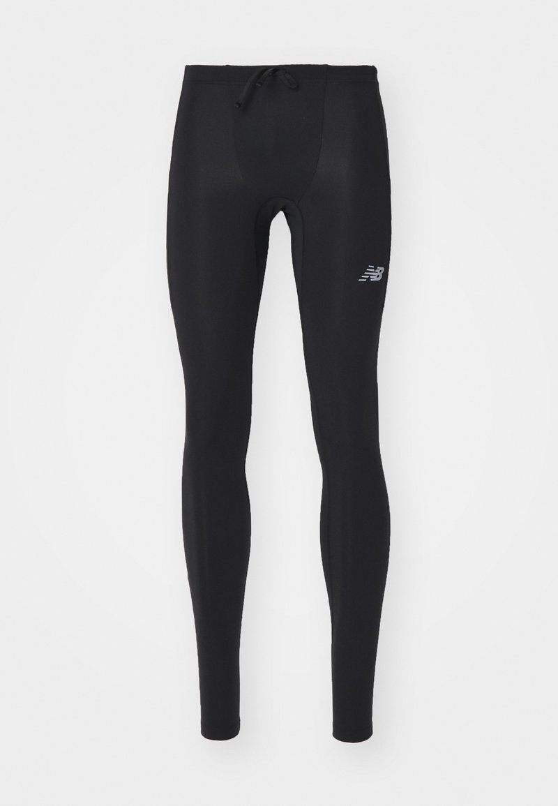 Leggings de sport noirs en matériau extensible, avec une taille à cordon de serrage et un petit logo sur la cuisse gauche.