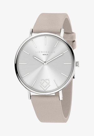 Zilveren wijzerplaat horloge met een minimalistisch ontwerp, zilveren wijzers en uurmarkeringen. Leren band in lichtbeige. Bevat een hartembleem.